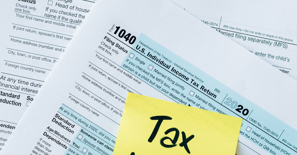 IRS 1040 tax forms with handwritten 'Tax Time!' note for filing reminder.